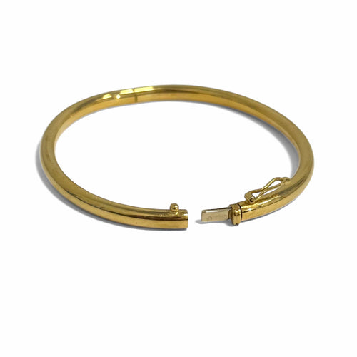 Bracelet jonc ouvrant moyen modèle en or jaune 18k
