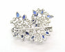 Broche Broche en or blanc avec diamants et saphirs 58 Facettes