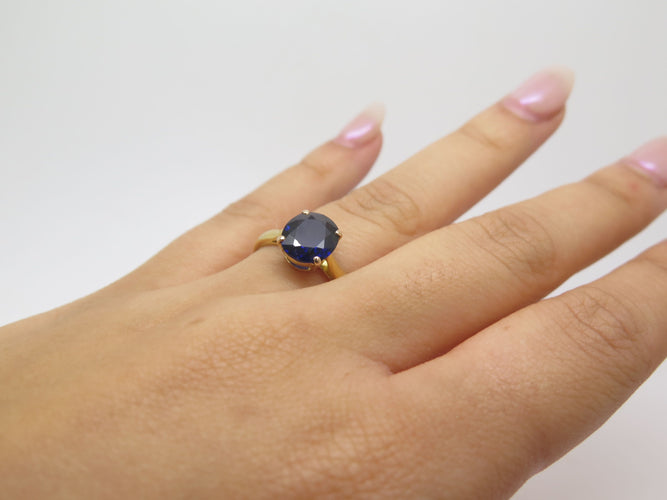 Bague Solitaire en or jaune et saphir 58 Facettes