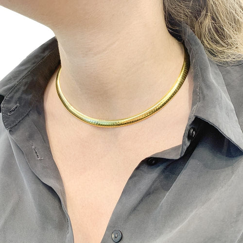 Collier vintage omega or jaune.