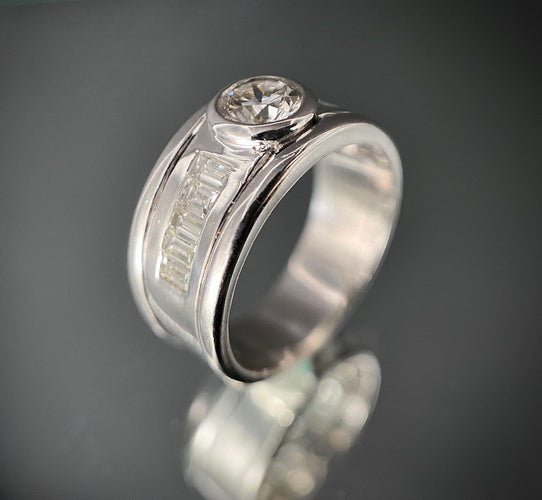 Bague 54 Bague or blanc sertie d'un diamants et 10 diamants taillés en baguette 58 Facettes