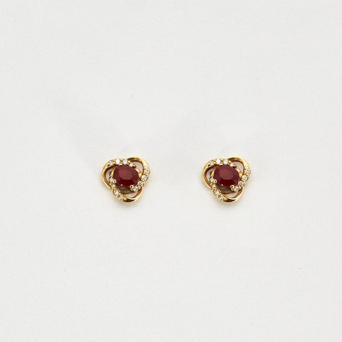 Boucles d'oreilles Paire de boutons d'oreilles en or jaune serties de 2 rubis et diamants 58 Facettes