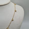 Collier Collier or jaune 18 carats serti de billes d’or 58 Facettes