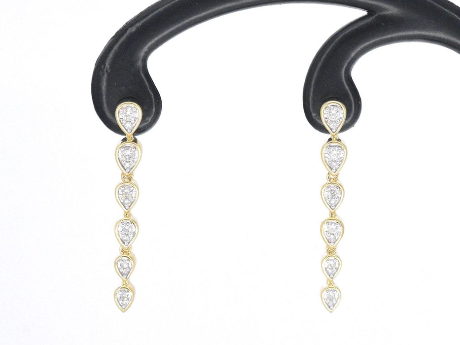 Boucles d'oreilles en or jaune avec diamants