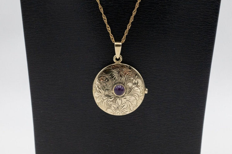 Pendentif Pendentif médaillon en or jaune avec améthyste, milieu du XXe siècle 58 Facettes 11403