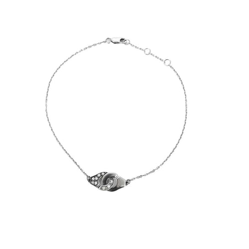 Bracelet DINH VAN - Menottes R8 - Bracelet or blanc et diamants 58 Facettes 240627