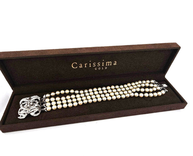 Bracelet de perles avec fermoir en or blanc 18 carats et diamants