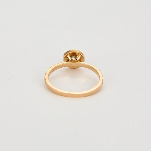 Solitaire "Gemmyo" entouré en or rose 18K et diamants 0,50 carat.