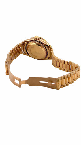 Montre Rolex Oyster perpetual Lady en or et diamants 58 Facettes