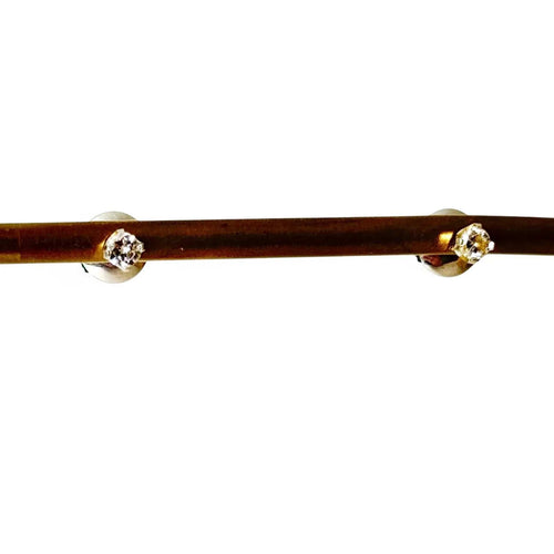 Boucles d'oreilles Paire de clous d'oreilles or gris et diamants 58 Facettes REF24077-240