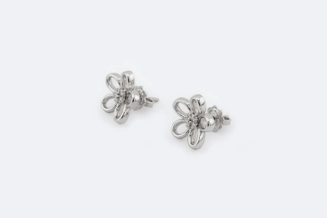 Boucles d'oreilles en or blanc avec diamants