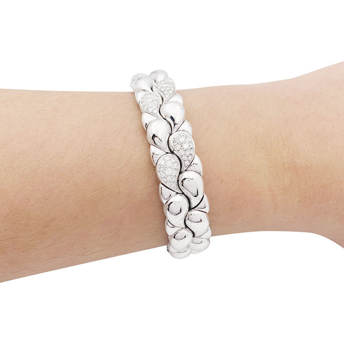 Bracelet Chopard "Casmir" or blanc, diamants.