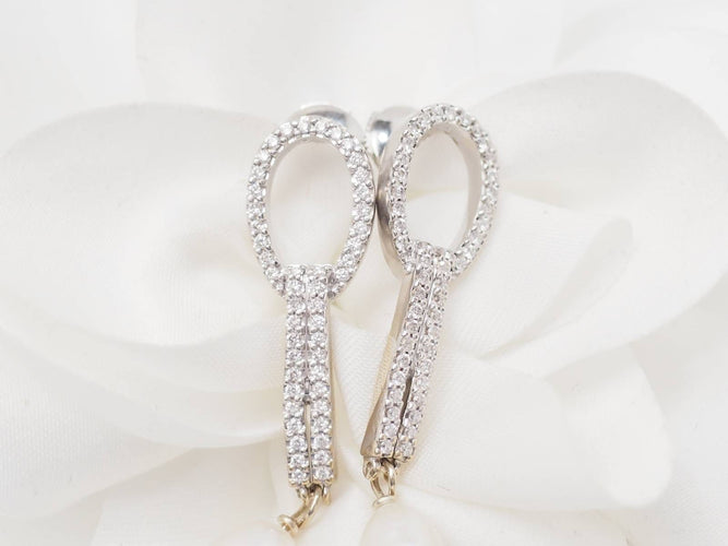 Boucles d'oreilles Pendants d'oreilles en or blanc, diamants et perles de culture 58 Facettes 33102