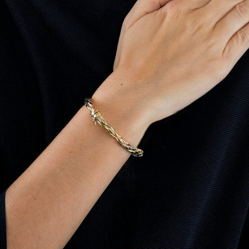 Bracelet Bracelet torsadé 3 ors 58 Facettes LP613