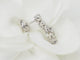Boucles d'oreilles Dormeuses anciennes en or blanc et diamants 58 Facettes 32108 O