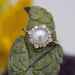 Ring 53 Akoya cultured pearl ring and its diamonds 58 Facettes 24-076