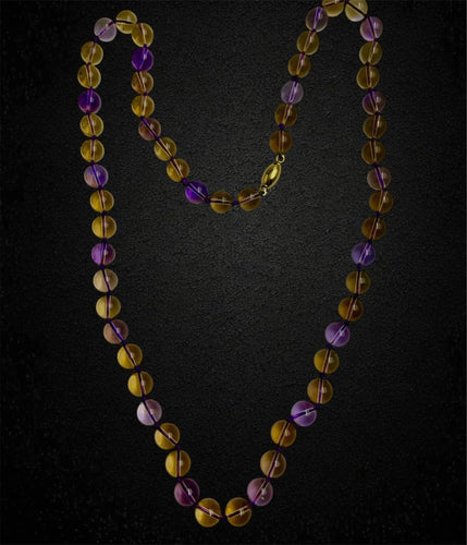 Collier Collier en quartz améthyste et citrine 58 Facettes