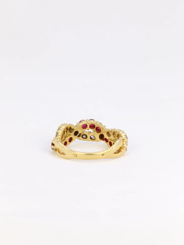 Bague 52 Bague vintage torsadée en or, diamants et rubis 58 Facettes 825