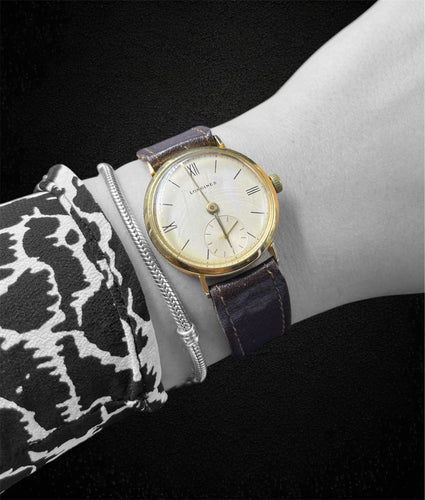 Montre-bracelet Longines Vintage en or jaune 18 carats