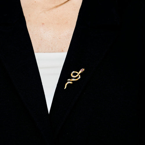 Broche Broche serpent or jaune et gris, rubis et diamants 58 Facettes NAR01482