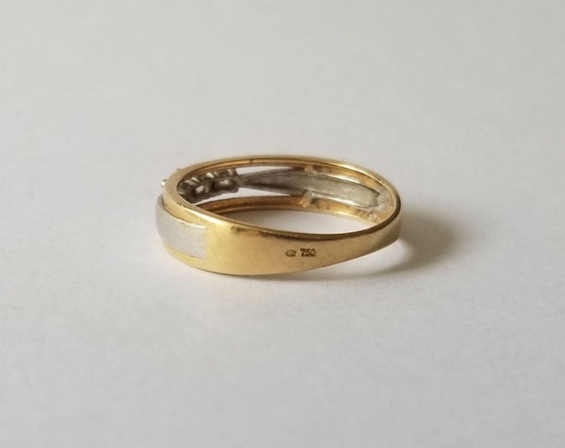 54 Bague or jaune et blanc, diamants 58 Facettes