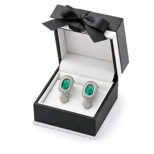 Boucles d'oreilles Boucles d'oreilles en or blanc ornées d'émeraudes ovales et de diamants. 58 Facettes 50361
