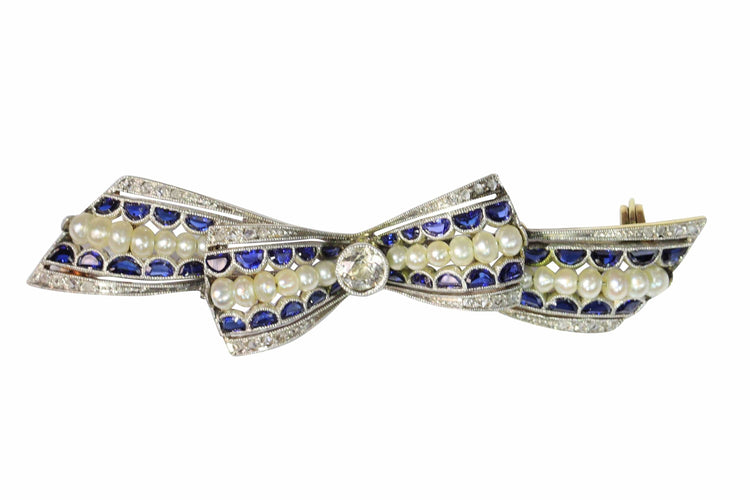 Broche Broche nœud vintage des années 1910 en saphirs et perles – Belle Époque Grace 58 Facettes 25191-0322