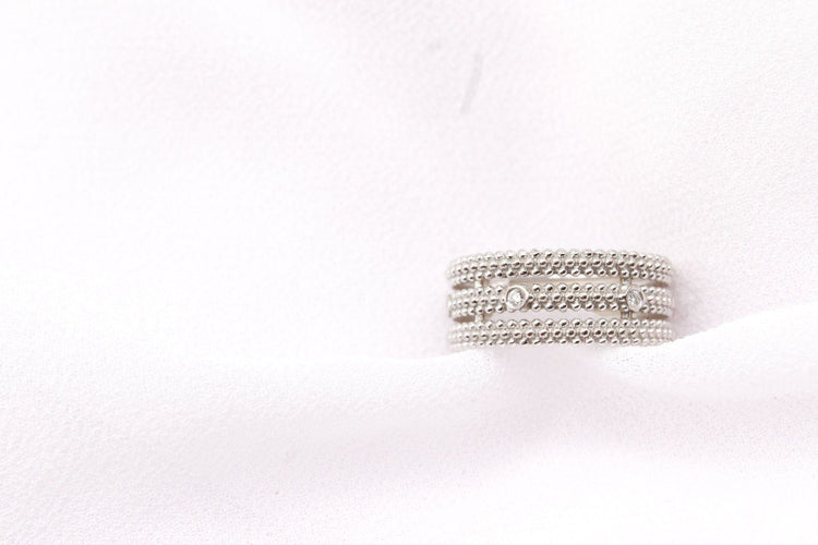 Bague Mauboussin - Bague Le Premier Jour 3 anneaux perlés en or blanc et diamants 58 Facettes 250354
