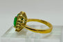 Bague 57 Bague en or jaune ornée d'une émeraude et de diamants. 58 Facettes 50290