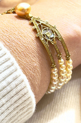 Bracelet Bracelet signé Alessio Boschi , or , perles et diamants jaunes 58 Facettes