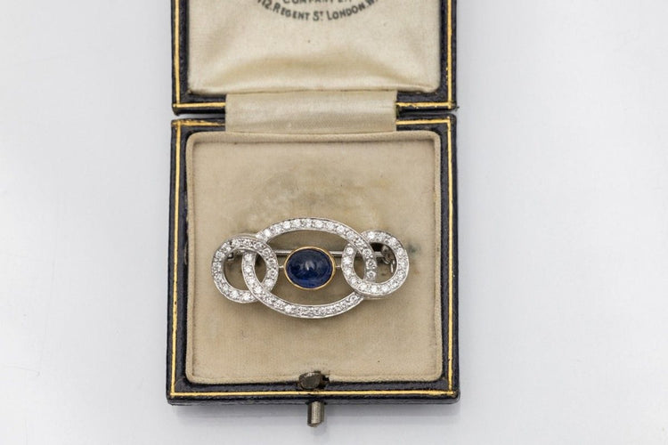 Broche Broche Art Déco saphir cabochon et diamants en or blanc 18k 58 Facettes 10835