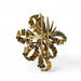 MELLERIO brooch - Yellow gold brooch, the center decorated with emerald, rubies and diamonds. 58 Facettes