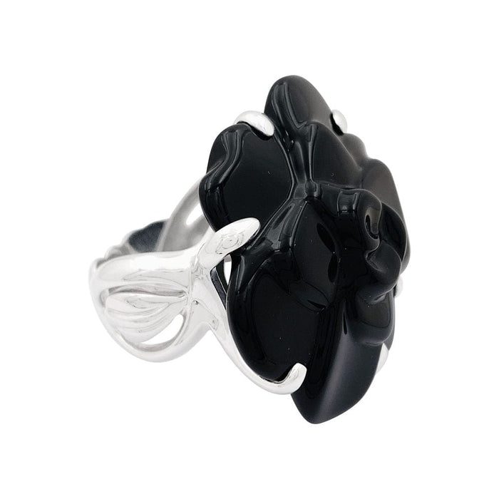 Bague 55 Bague Chanel, modèle "Camélia", en or blanc et onyx. 58 Facettes 34027