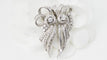 Broche Broche Art déco double clips en or blanc et platine, diamants 58 Facettes 32946