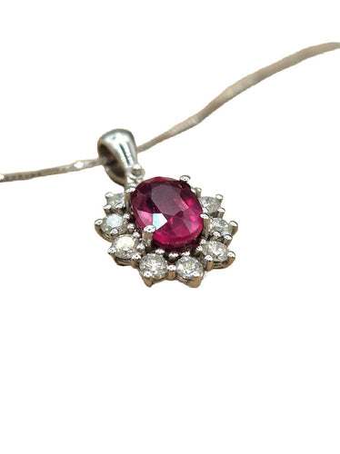 Pendentif Pendentif en or blanc avec rubis et diamants 58 Facettes