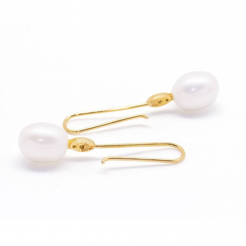 Boucles d'oreilles Boucles d'oreilles perle ovale et diamant 58 Facettes D360904FV