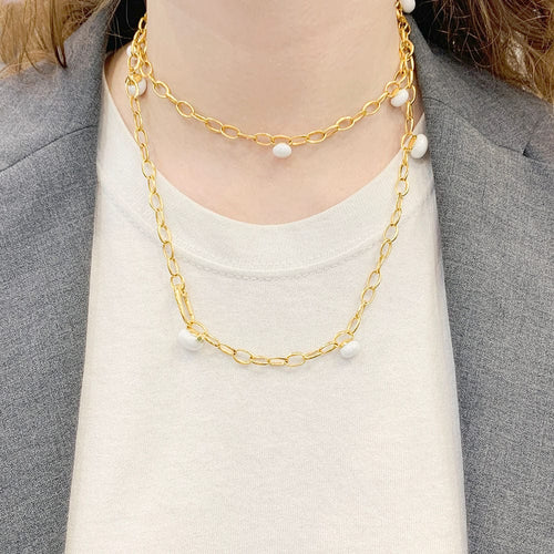 Collier Sautoir Pomellato, "Capri", or rose, céramique blanche. 58 Facettes 33659