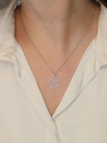 Collier POIRAY - Collier coeur entrelacé or blanc diamants 58 Facettes 1091.1