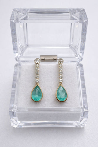 Boucles d'oreilles Boucles d'oreilles en or blanc et jaune ornées d'émeraudes taille poire et de diamants 58 Facettes 50375