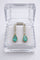Boucles d'oreilles Boucles d'oreilles en or blanc et jaune ornées d'émeraudes taille poire et de diamants 58 Facettes 50375