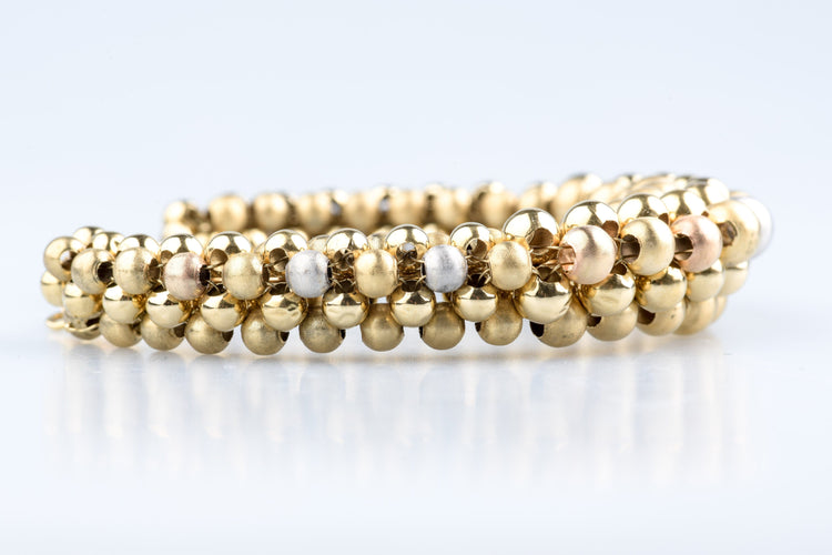 Bracelet Bracelet boules en trois ors 18k or jaune, blanc et rose 58 Facettes BRBLECC1325-107