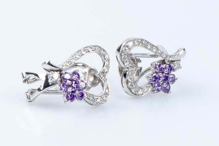 Bague Bague coeurs et fleurs en or blanc 18 carats 58 Facettes 111.20995-53