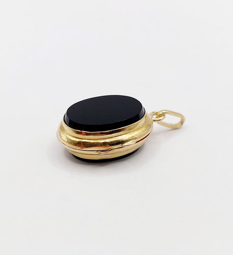 Pendentif Pendentif porte-photo or jaune et onyx (circa 1900) 58 Facettes A05916