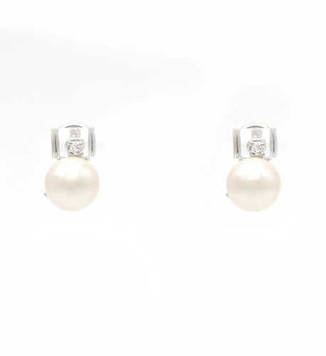 Boucles d'oreilles Boucles d'oreilles en or blanc avec perles et diamants 58 Facettes 13967