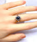 Bague 54 Bague marguerite en or blanc, saphir et diamants 58 Facettes AB576