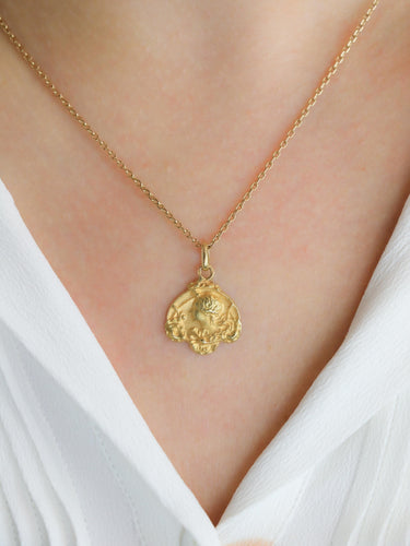 Pendentif Médaille Art Nouveau femme de profil or jaune 58 Facettes 1153.8