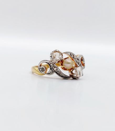 Bague 51 Bague tourbillon or jaune, diamants et perle 58 Facettes A05451