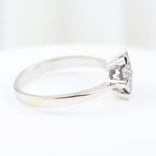 Bague Bague rosette en or blanc 18 carats sertie de diamants taille brillant de 0,28 carat 58 Facettes 159/24K