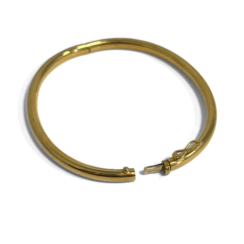 Bracelet jonc ouvrant moyen modèle en or jaune 18k