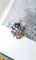 Broche Broche ancienne operculum, grenat, et porcelaine 58 Facettes